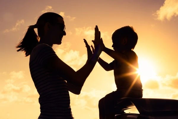 Image of happy mother and child after resolving child arrangements Lowestoft